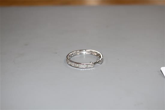 A modern single 14k white metal and baguette cut diamond set hoop earring, width 30mm, gross 5 grams.